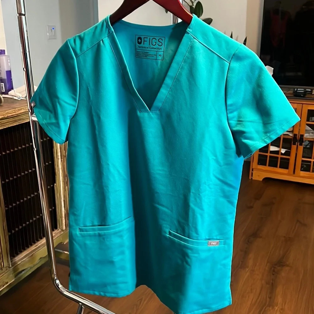 Figs top. Size XS Aqua blue